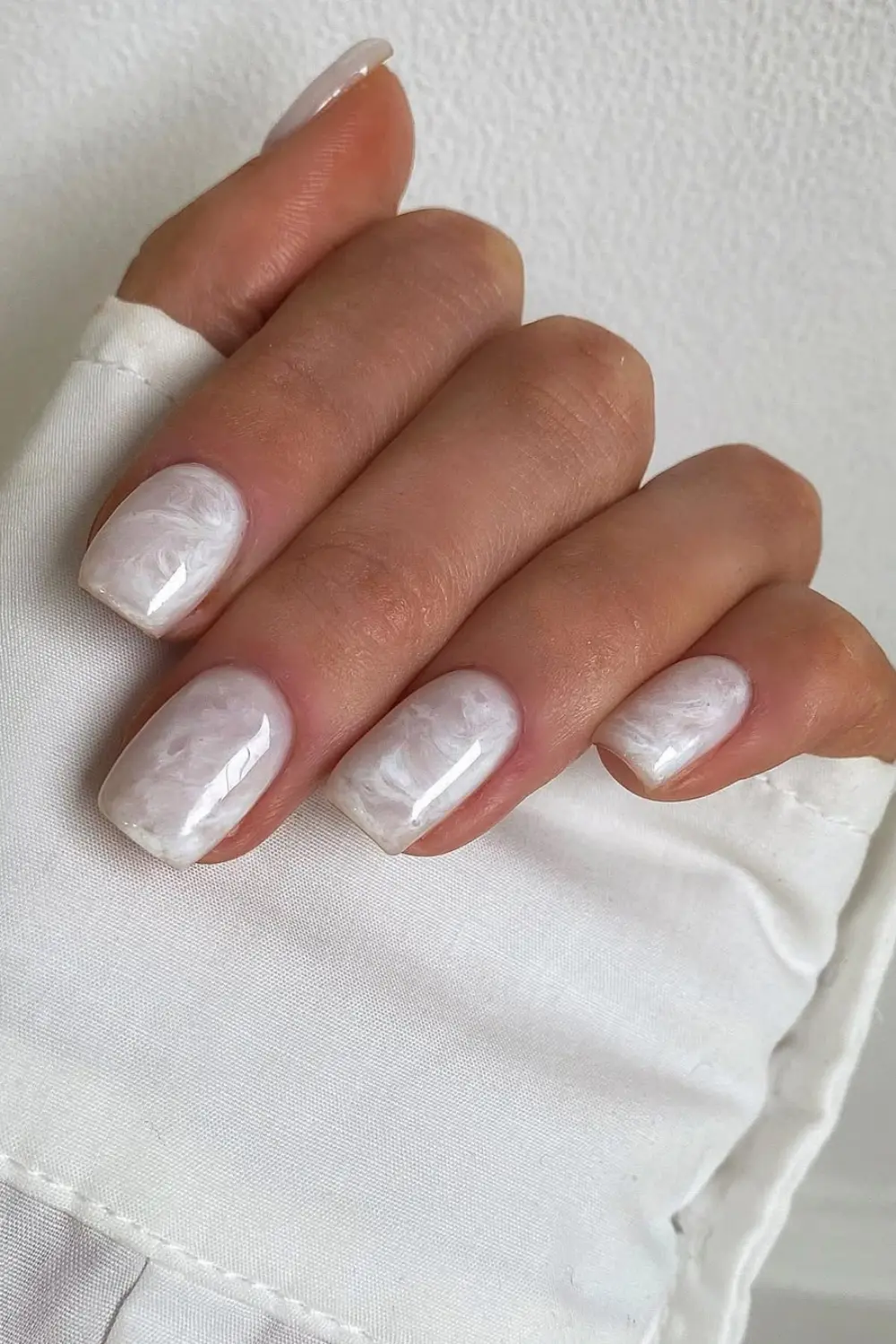 17 White Nail Designs That Look Simple Until You Try Them On 7 White Marble Nail Design solotravely