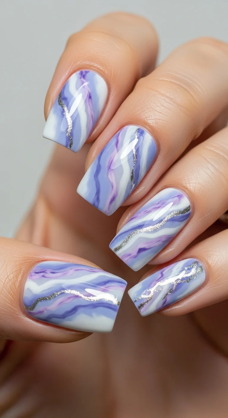 18 Blue Nails Ideas That Somehow Look Different Every Time 14 Periwinkle Blue Marble Effect