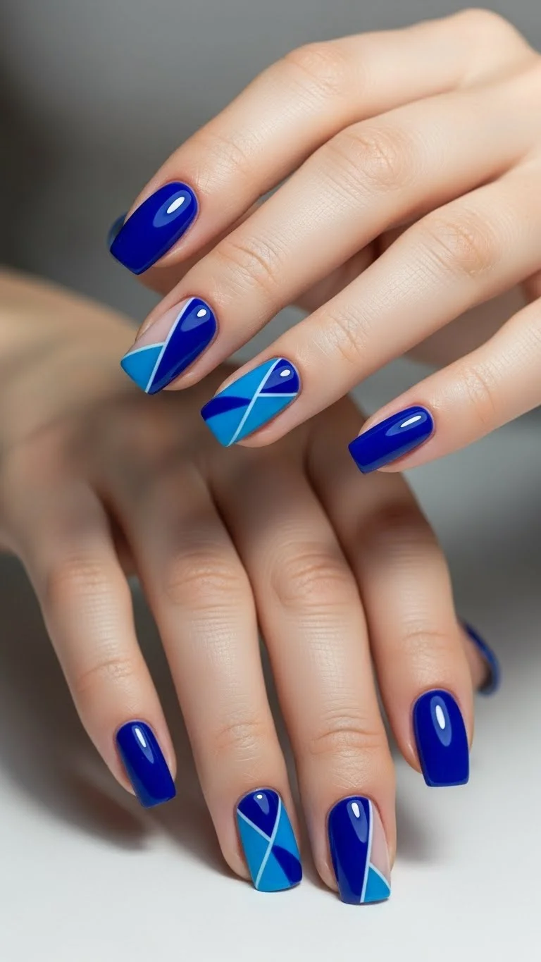 19 Acrylic Nail Ideas That'll Make Your Hands Pop in 2026 5 Geometric Shapes in Bold Blues