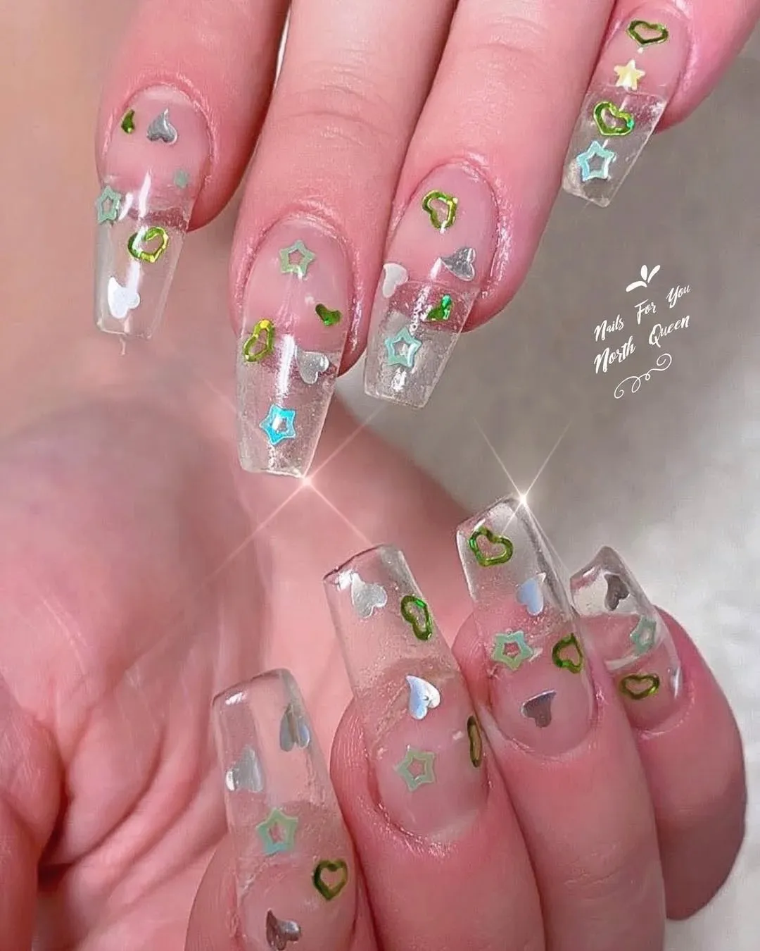 18 Creative Coffin Nails Ideas 2026 | Trendy & Stylish Nail Designs 11 Clear Coffin Nails with Embedded Art