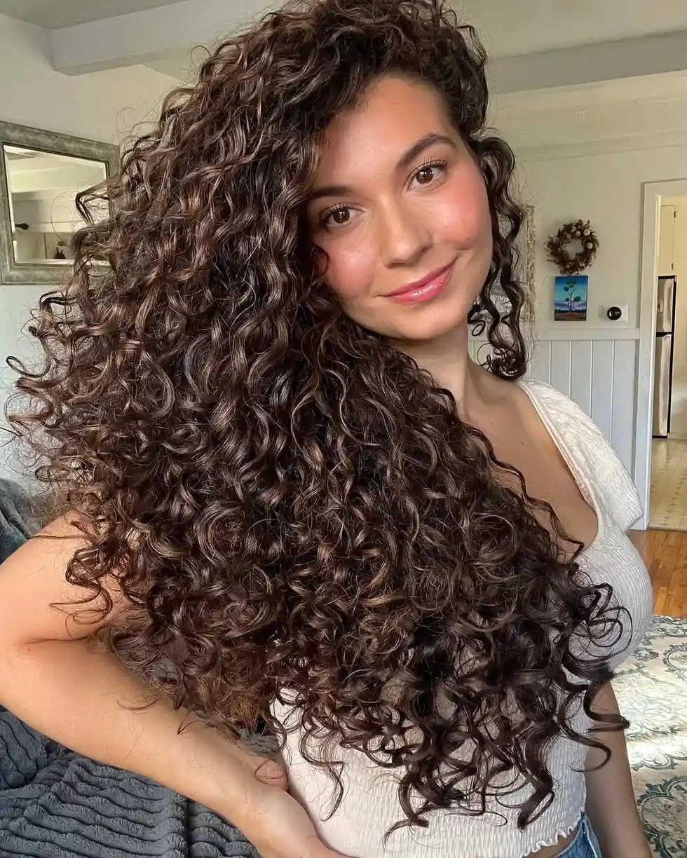 17 Long Layered Haircuts with Curtain Bangs Are Everywhere Now 11 Curtain Bangs with Extreme Long Layers and Volume