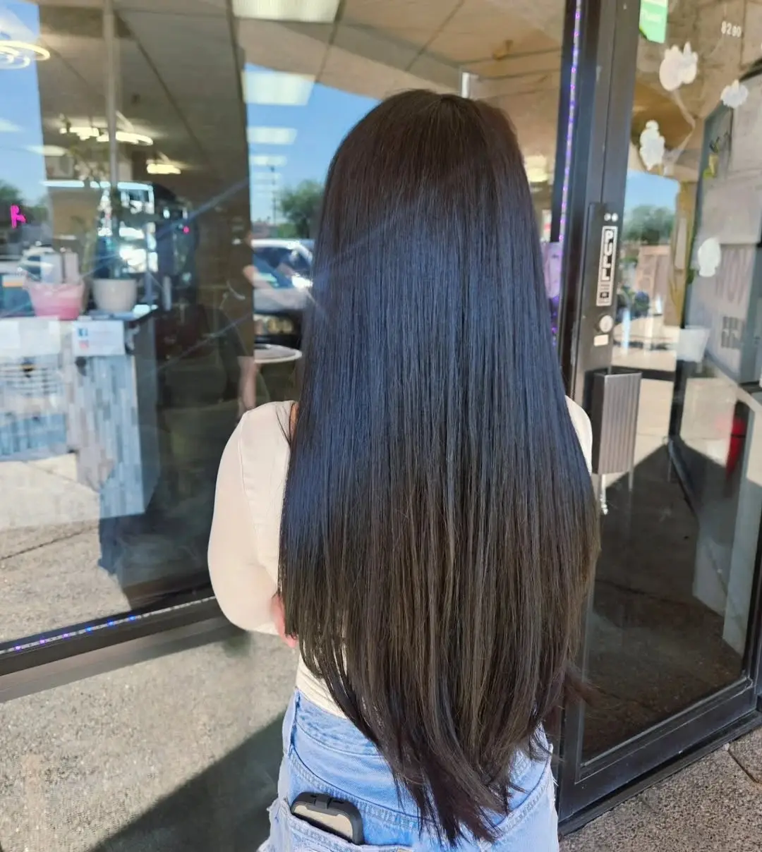 17 Long Layered Haircuts with Curtain Bangs Are Everywhere Now 5 Curtain Bangs with V-Cut Layered Back