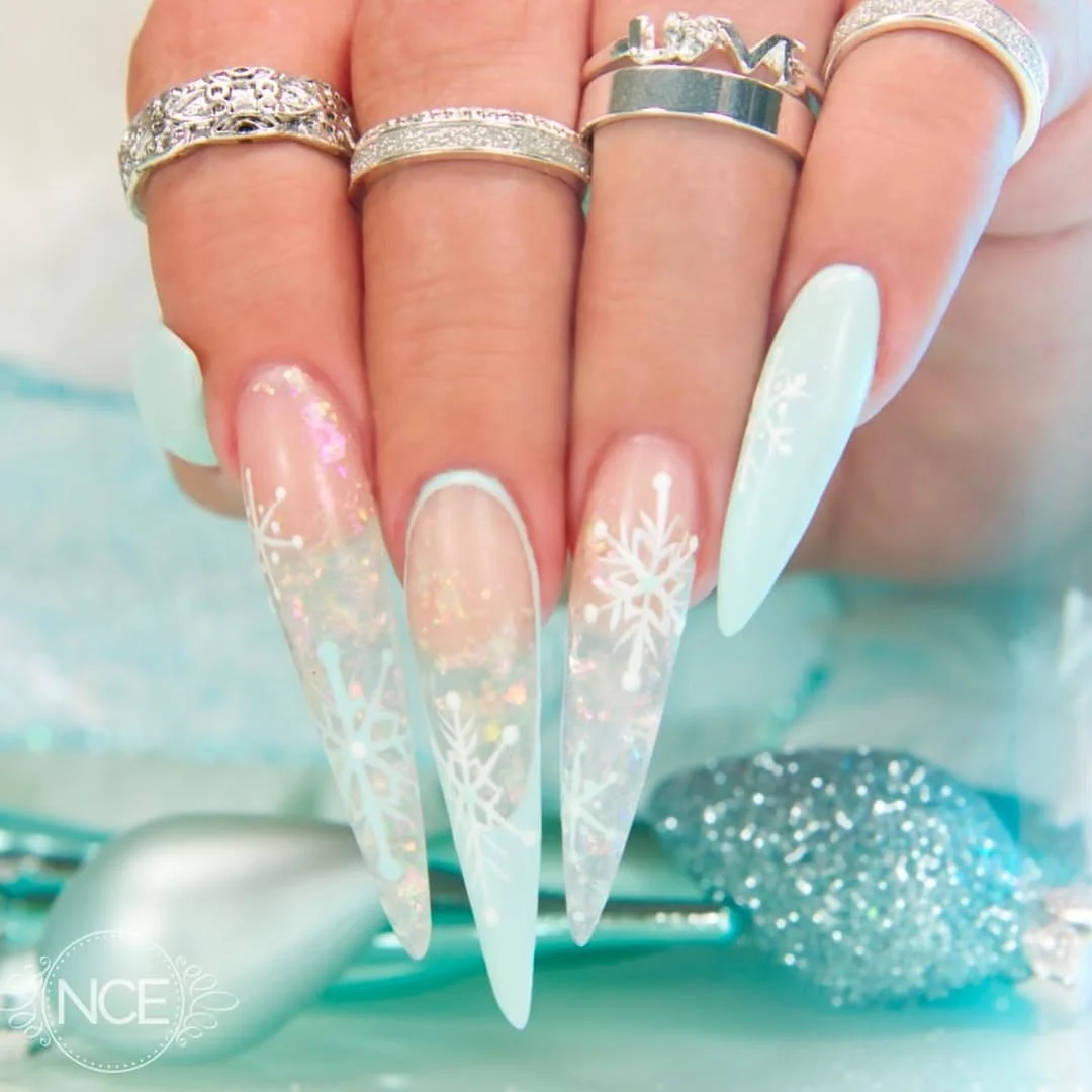 17 Nail Design Ideas February 2026: Fresh Looks That'll Make Everyone Ask "Where Did You Get Those Done?" 9 Frosted Snowflake Accents