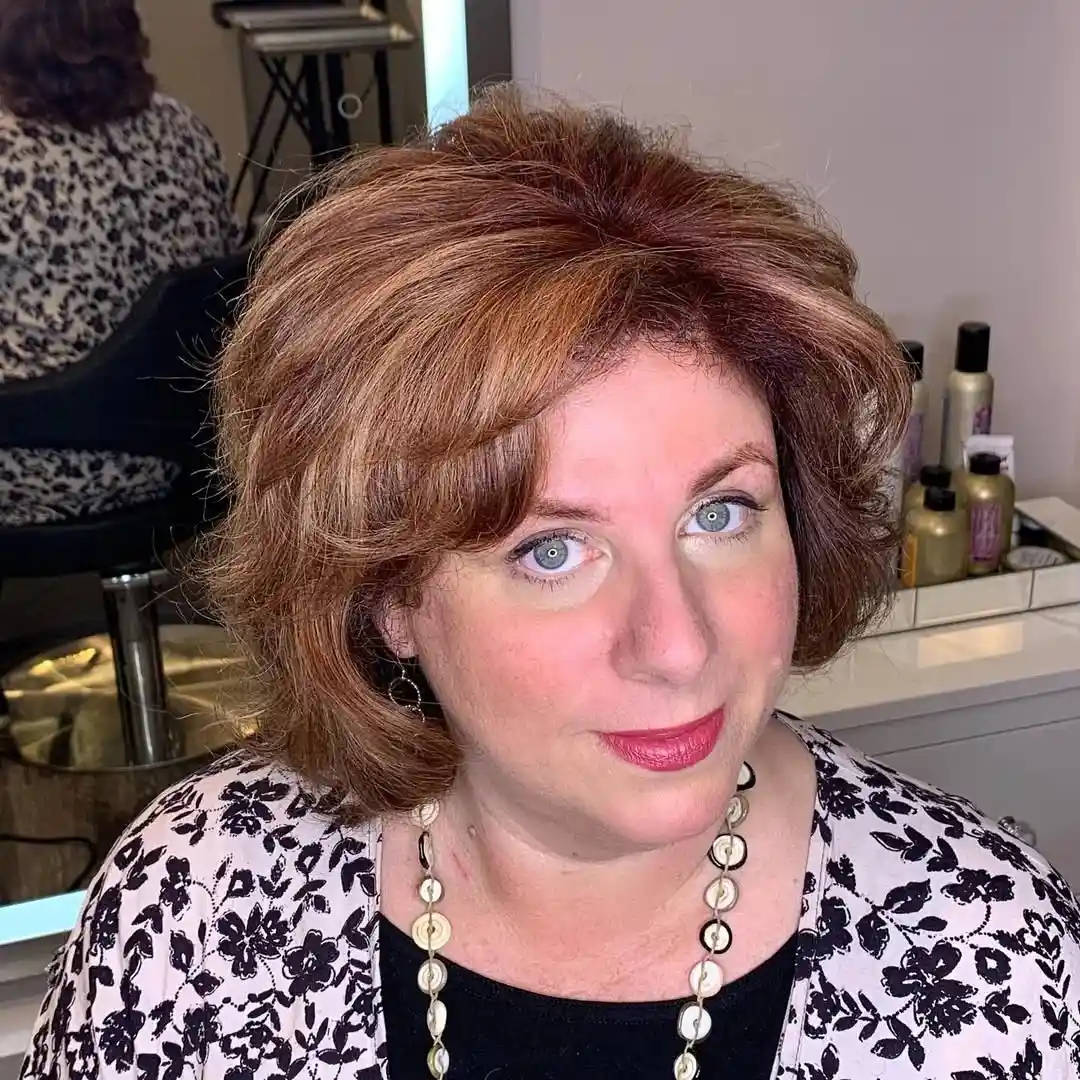 20 Summer Medium Haircuts Ideas 2026: Your Ultimate Style Guide 4 Layered Shag with Curtain Bangs