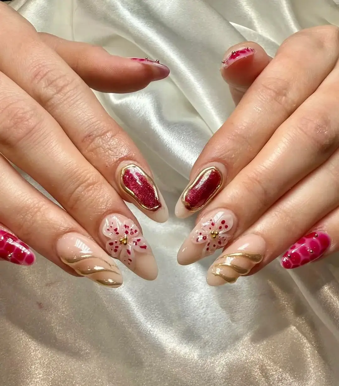 17 Nail Design Ideas February 2026: Fresh Looks That'll Make Everyone Ask "Where Did You Get Those Done?" 16 Ruby Red Rhinestone Glamour