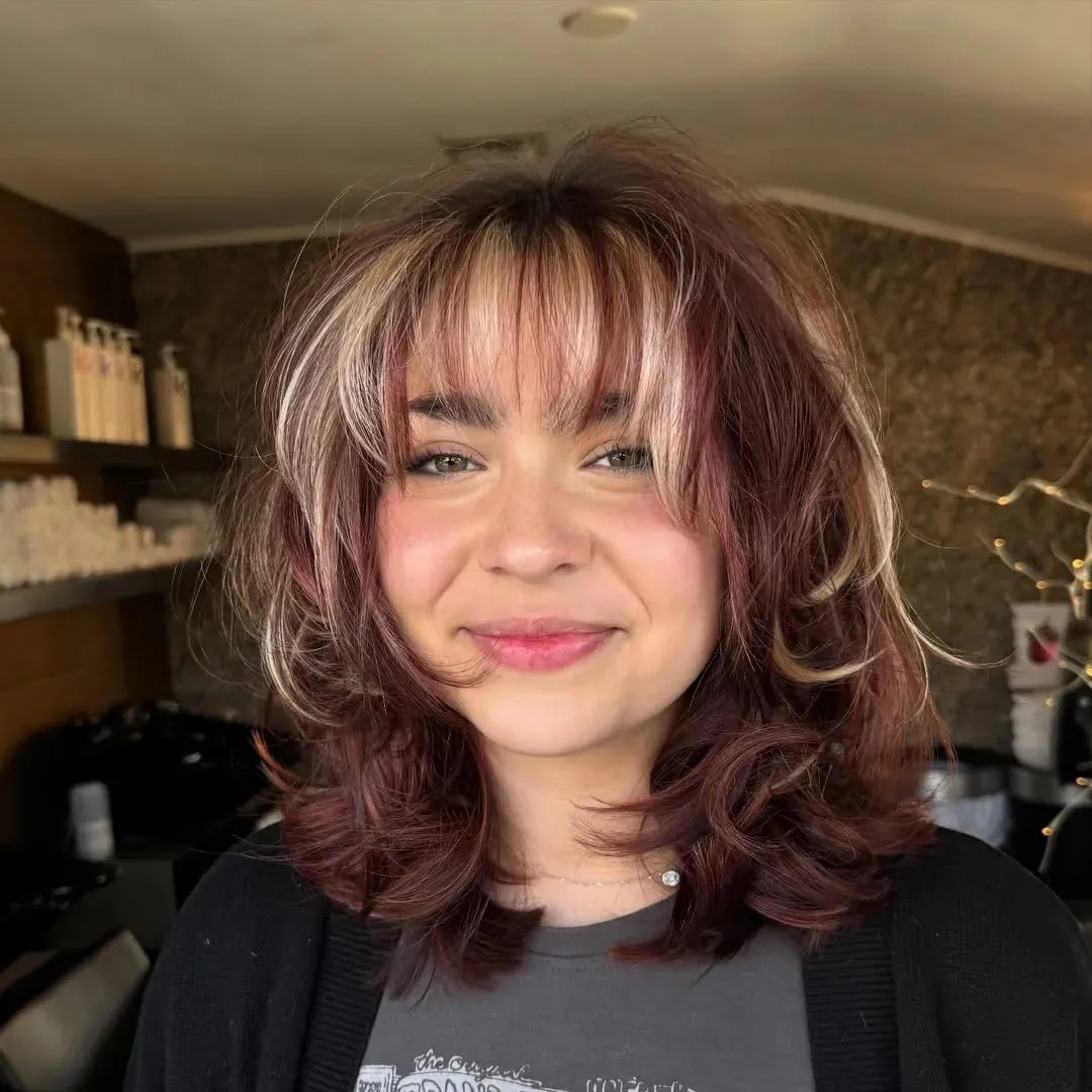 15 Chic Medium Length Hairstyles for Women 2026: Your Complete Style Guide 3 Textured Shag Cut