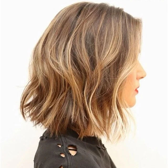 15 Chic Medium Length Hairstyles for Women 2026: Your Complete Style Guide 7 Wavy Mid-Length with Highlights