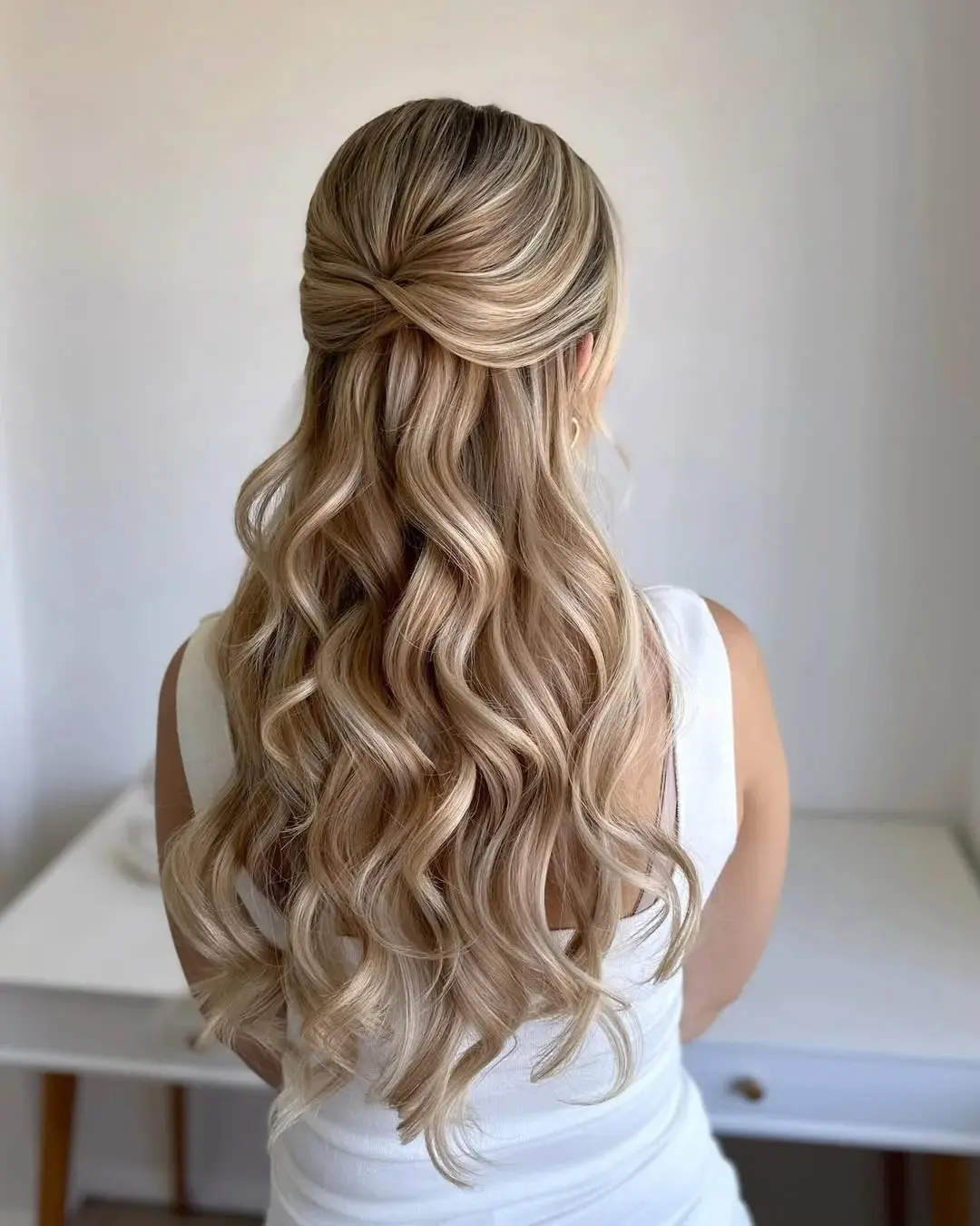 17 Hot Weather Hairstyles Ideas That'll Keep You Cool (Without Looking Like You Just Rolled Out of Bed) 8 Half-Up Half-Down with Twist