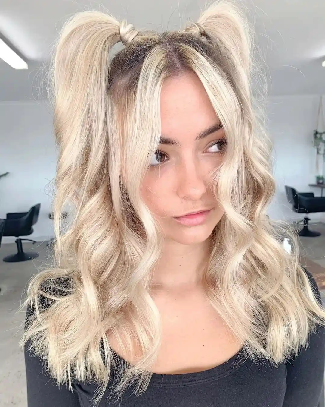 17 Hot Weather Hairstyles Ideas That'll Keep You Cool (Without Looking Like You Just Rolled Out of Bed) 14 High Pigtails