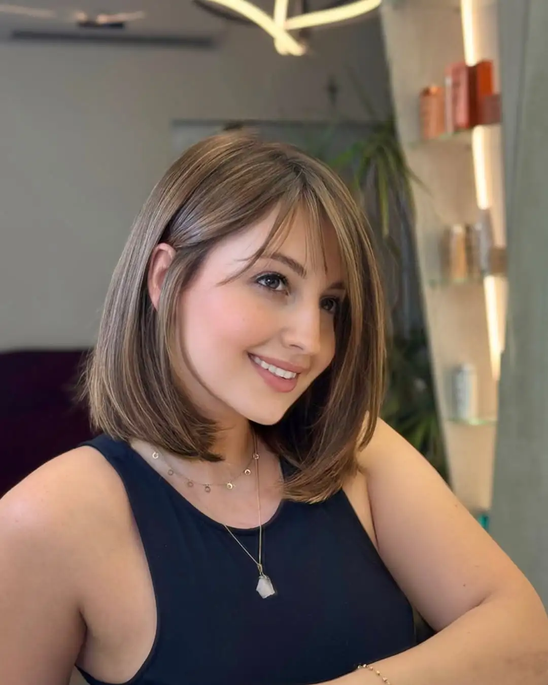 14 Curtain Bangs with Layers: The Ultimate Style Guide for Effortless Chic Looks 12 The Blunt Bob with Curtain Bangs