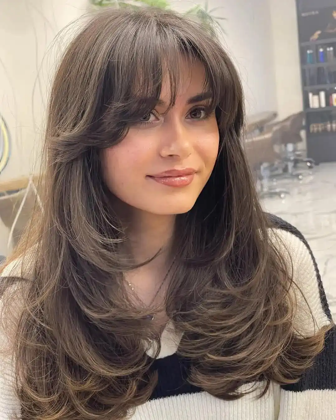 14 Curtain Bangs with Layers: The Ultimate Style Guide for Effortless Chic Looks 13 The High-Volume Layers