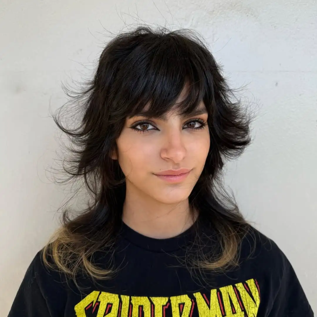 14 Curtain Bangs with Layers: The Ultimate Style Guide for Effortless Chic Looks 7 The Shaggy Layers Look