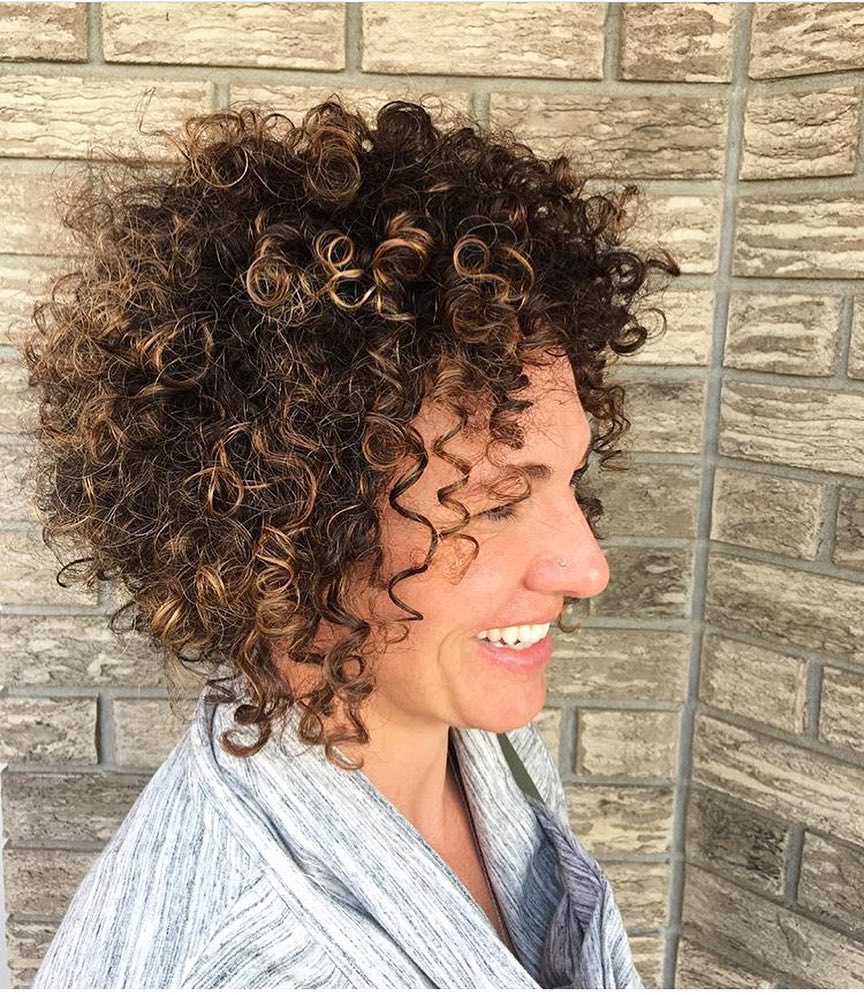 14 Short Hair Twist Styles That'll Instantly Elevate Your Look 10 Tight Curls + Bold Bangs