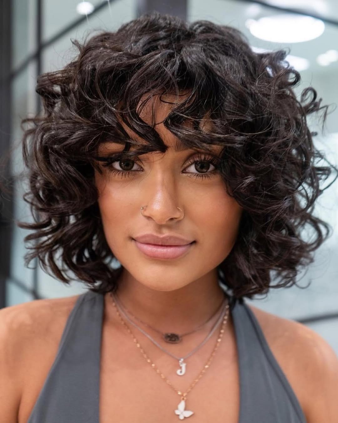 14 Short Haircuts for Women That Will Have You Feeling Chic & Sassy (Because Who Needs Long Hair Anyway?) 6 Curly Bob