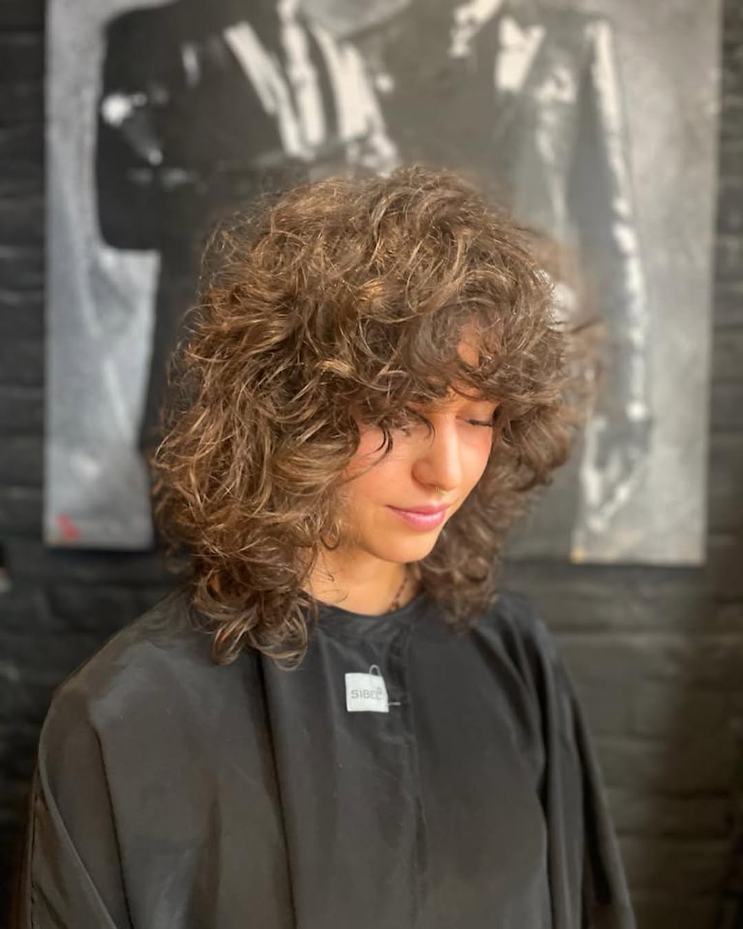 11 Short Wolf Cut Ideas 2026: The Boldest Styles You Need to Try Right Now 6 Curly Short Wolf Cut