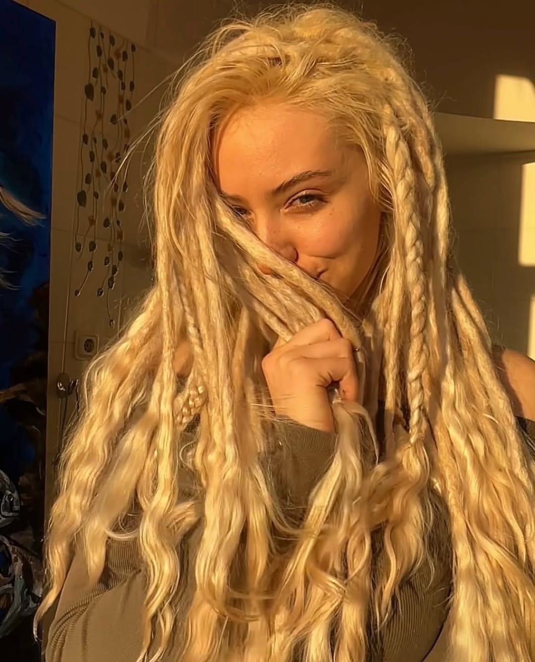 13 Dreadlock Hairstyle Ideas That Are Seriously Cool, Stylish, and So Easy to Wear 11 Dreadlocks with Beads and Cuffs