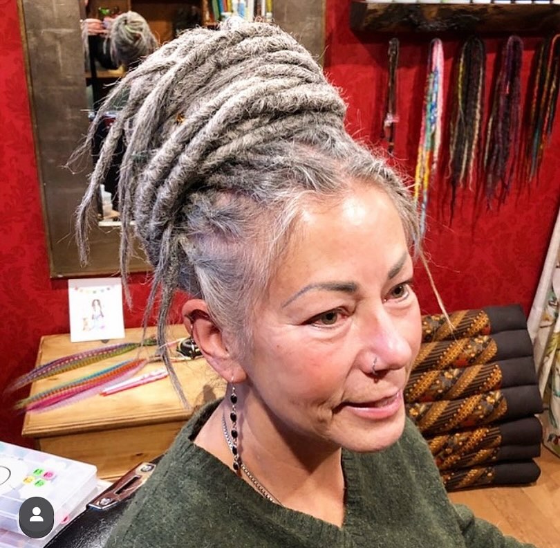 13 Dreadlock Hairstyle Ideas That Are Seriously Cool, Stylish, and So Easy to Wear 2 High Bun Dreadlocks