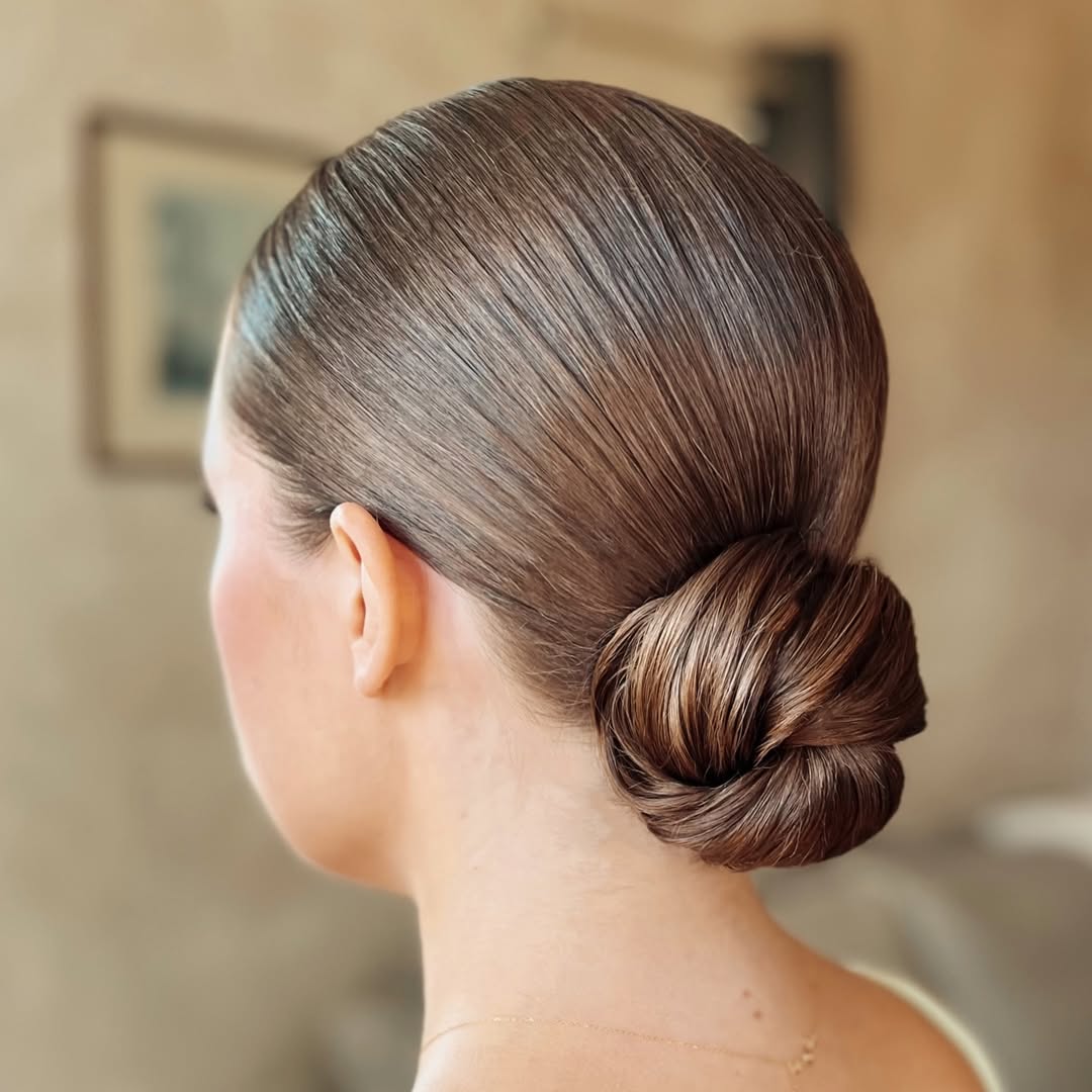 15 Bridal Hairstyle Ideas That Are So Pretty, You’ll Want to Get Married Twice 2 Low Chignon with Face-Framing Pieces