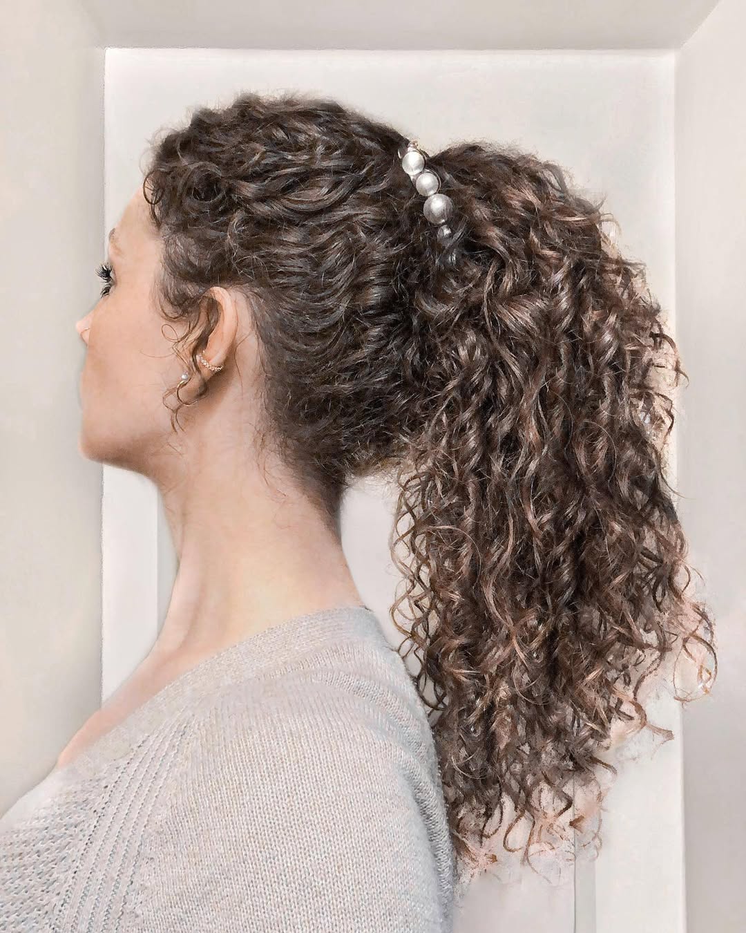 15 Black Hairstyle Ideas That'll Have You Feeling Like a Goddess Tomorrow (No Salon Drama Required!) 9 Pineapple Updo