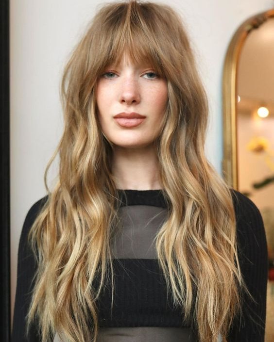 12 Wolf Cut With Bangs Ideas 2026 — The Trendy Hairstyle Guide You Have Been Waiting For 13 Soft Wolf Cut With Grown