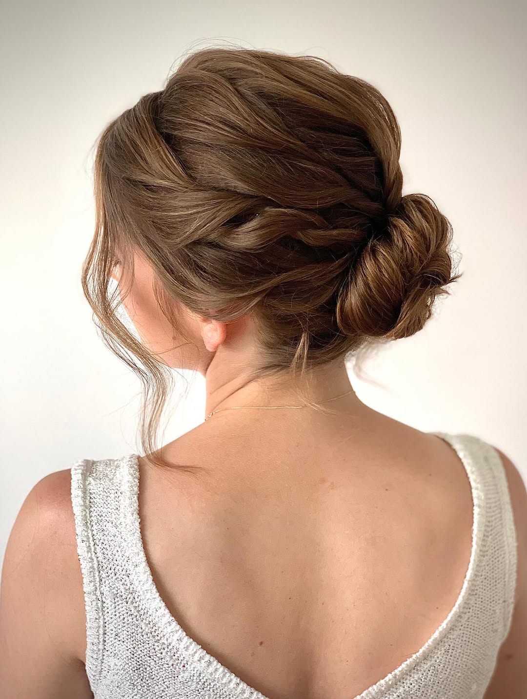 15 Bridal Hairstyle Ideas That Are So Pretty, You’ll Want to Get Married Twice 4 Textured Low Bun