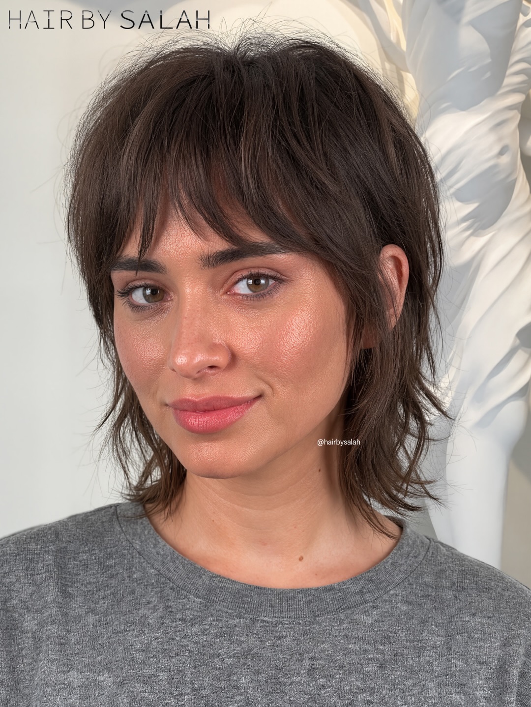 13 Easy Short Hairstyles That'll Make You Look Like You Walked Straight Out of a Fashion Magazine 4 Textured Shag Cut