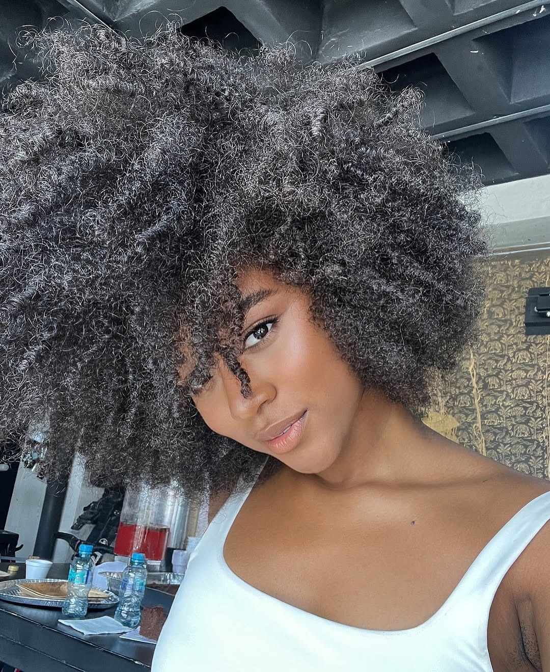 13 Short Curly Hair Ideas 2026: Transform Your Look With These Trendy Styles 8 The Coil Crown