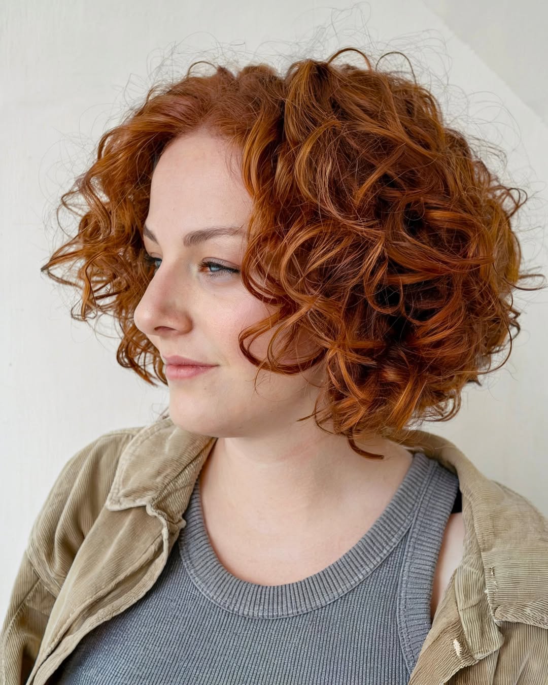 13 Short Curly Hair Ideas 2026: Transform Your Look With These Trendy Styles 7 The Curly Bangs with Short Hair