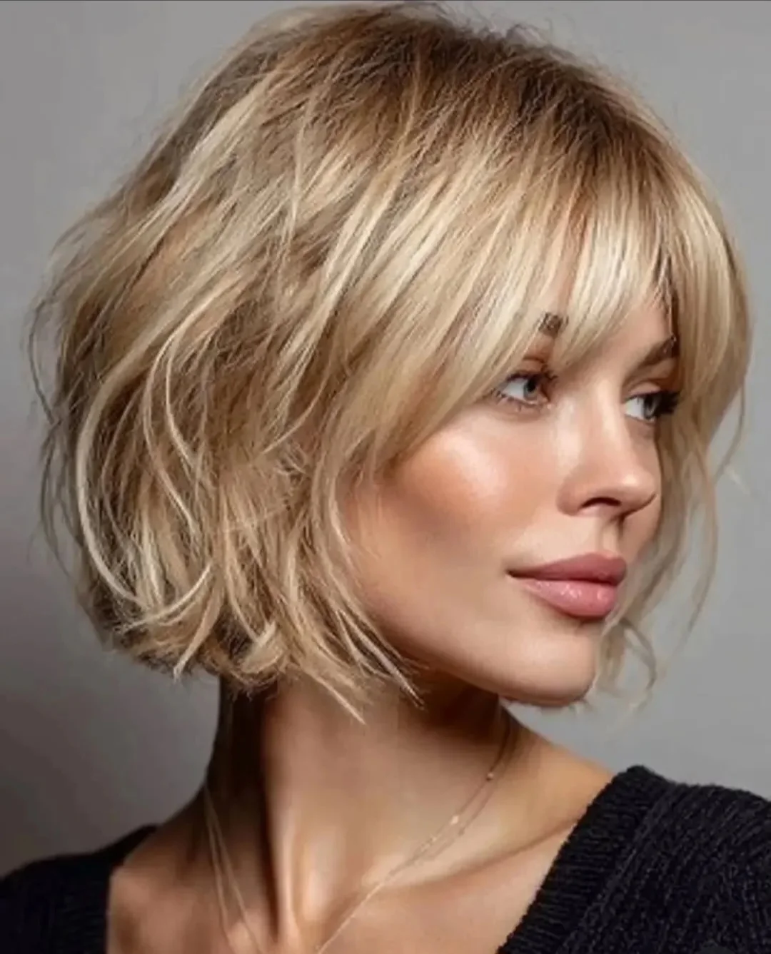 14 Short Haircuts for Women That Will Have You Feeling Chic & Sassy (Because Who Needs Long Hair Anyway?) 15 The Flirty Bob with Bangs
