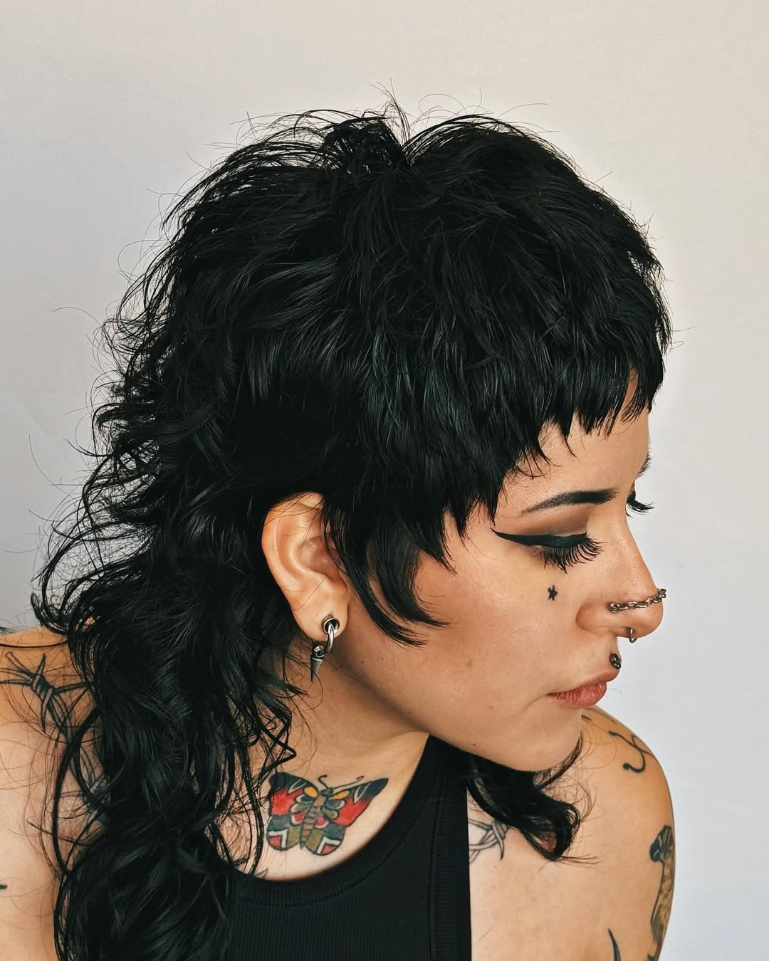 12 Wolf Cut Hair Ideas 2026: The Ultimate Guide to the Hottest Haircut Trend 9 The Mullet-Inspired Wolf Cut