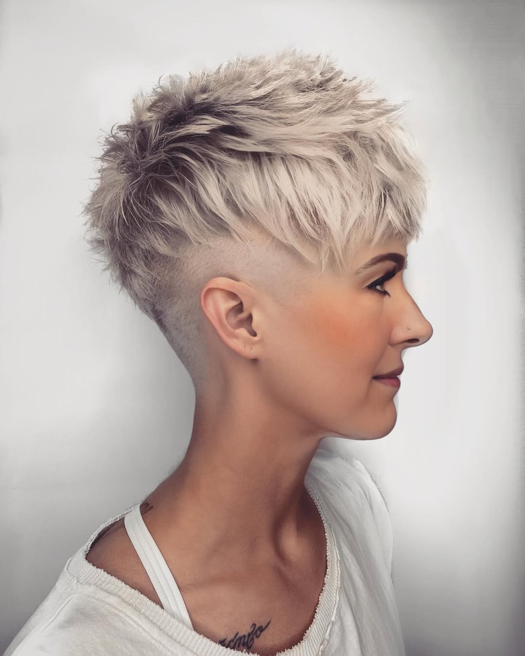 14 Short Haircuts for Women That Will Have You Feeling Chic & Sassy (Because Who Needs Long Hair Anyway?) 7 The Undercut Pixie