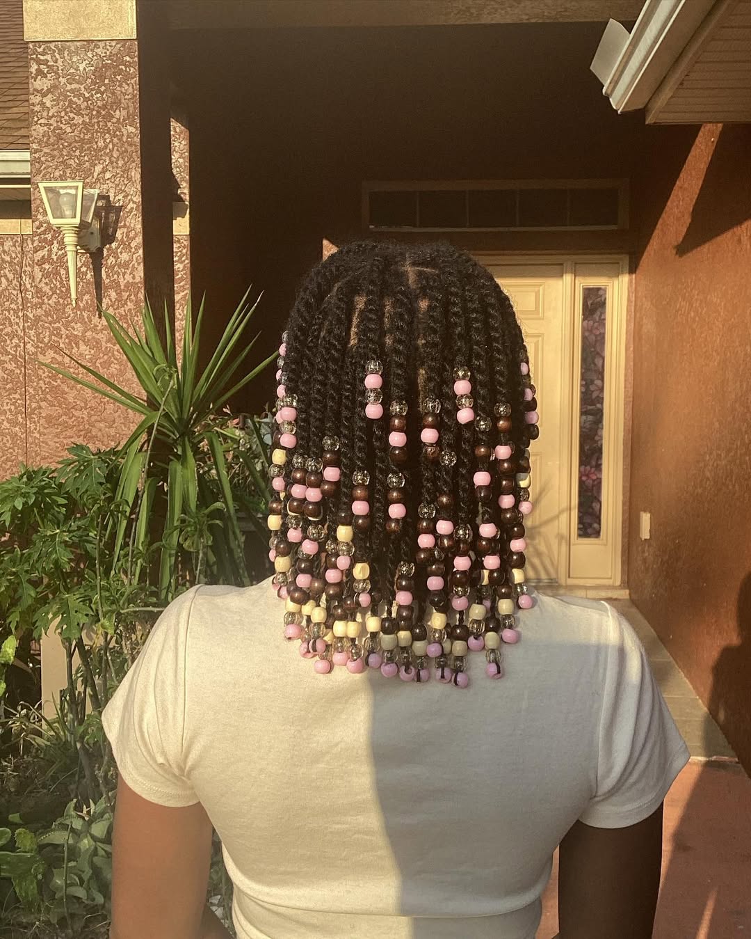 13 Twist Hairstyles Ideas That Are Cute, Low-Effort, and Honestly So Good 12 Twists with Beads