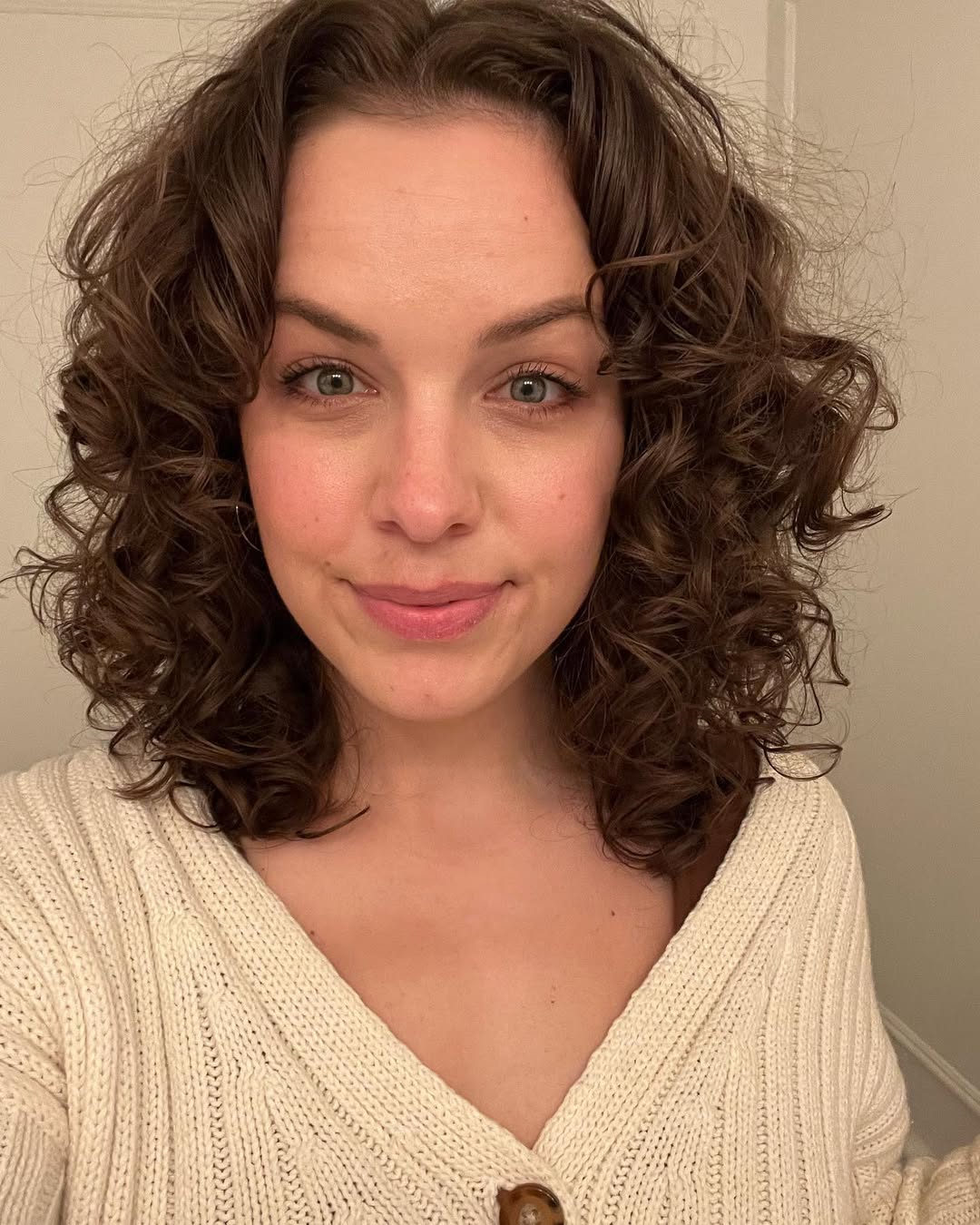 14 Middle Part Hairstyles Ideas That’ll Make You the Hair Icon of 2026 (Bye, Side Part Drama!) 4 Voluminous Curls Middle Part