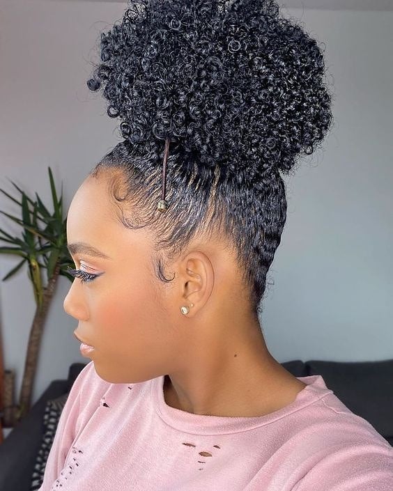 13 Hairstyles for Black Women That Are Giving Main Character Energy Right Now 5 Afro Puff