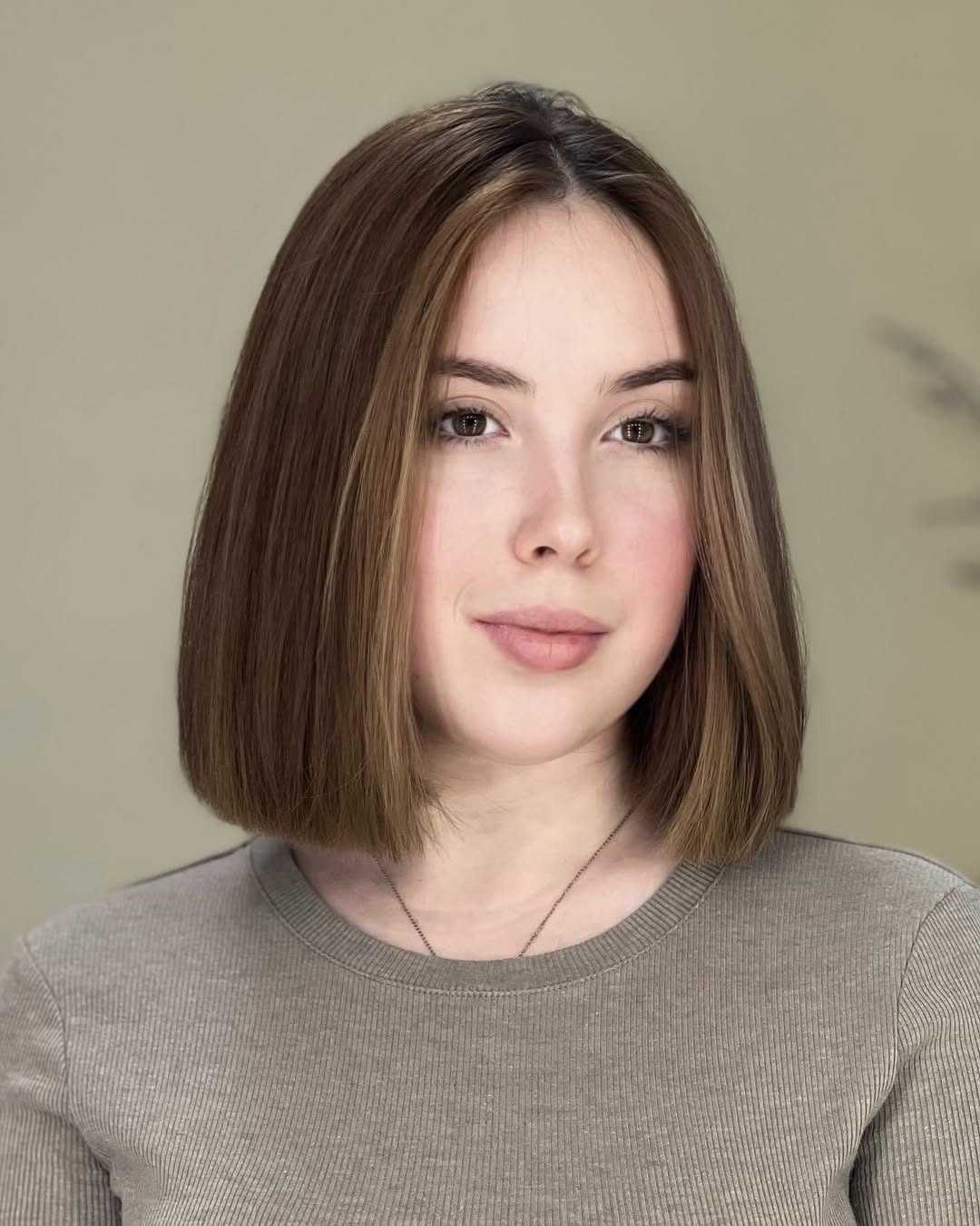 15 Round Face Hairstyles That Instantly Slim, Sculpt & Serve Main-Character Energy 9 Asymmetrical Bob