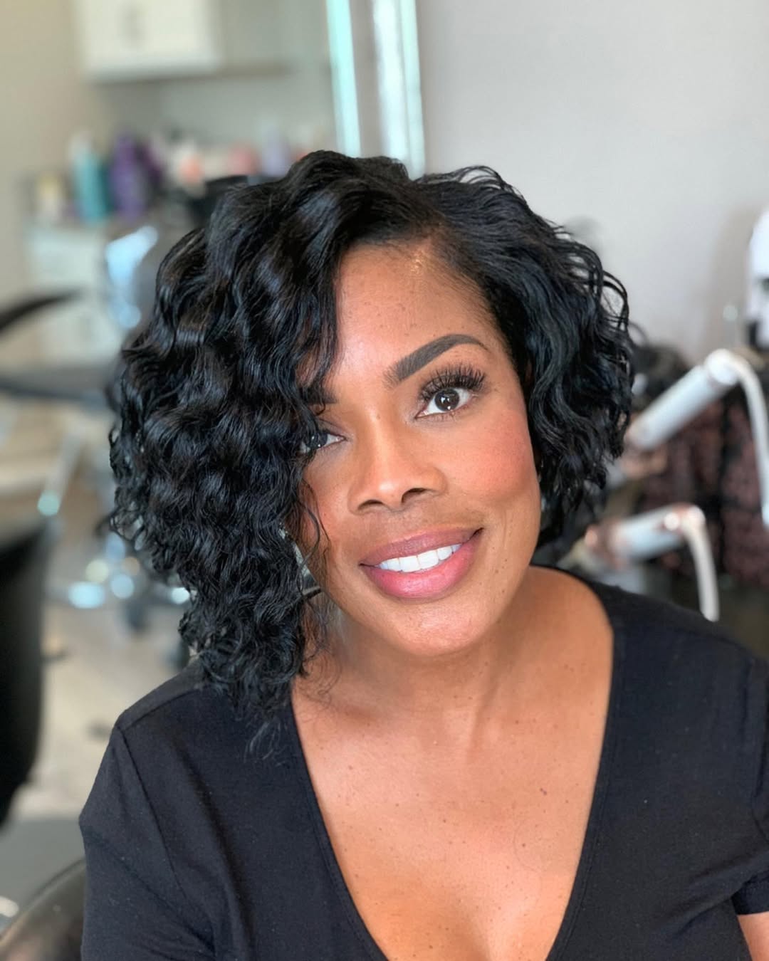 15 Short Curly Bob Hairstyles That’ll Instantly Make You Look Like That Girl 5 Asymmetrical Curly Bob