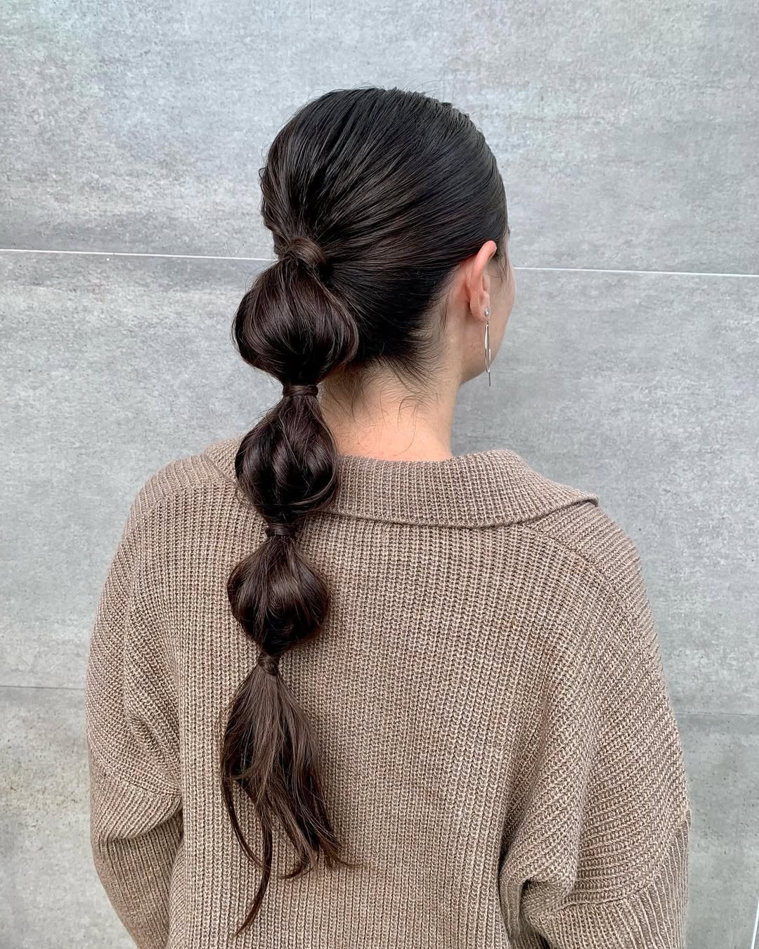 15 Curly Ponytail Hairstyles That Will Instantly Upgrade Your Entire Vibe 5 Bubble Curly Ponytail