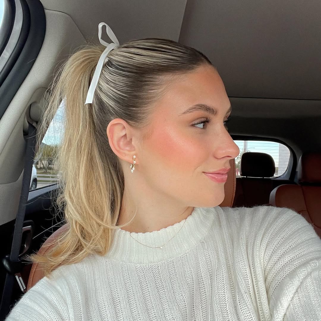 17 Slick Back Curly Hairstyles That Will Instantly Upgrade Your Look (Effortless Chic Alert) 2 Classic Slick Back Ponytail