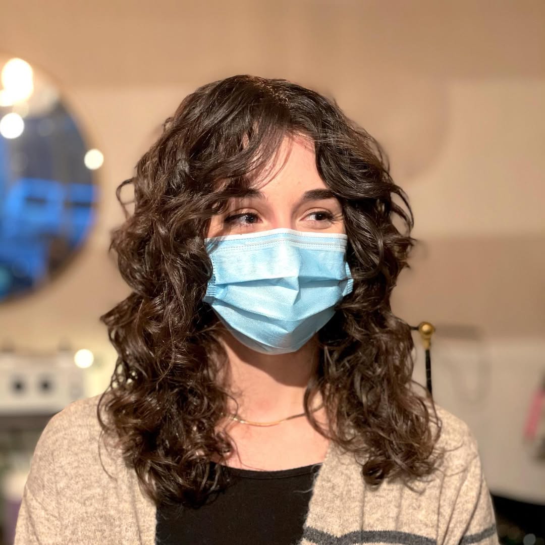 15 Short Curly Bob Hairstyles That’ll Instantly Make You Look Like That Girl 13 Curly Bob with Curtain Bangs