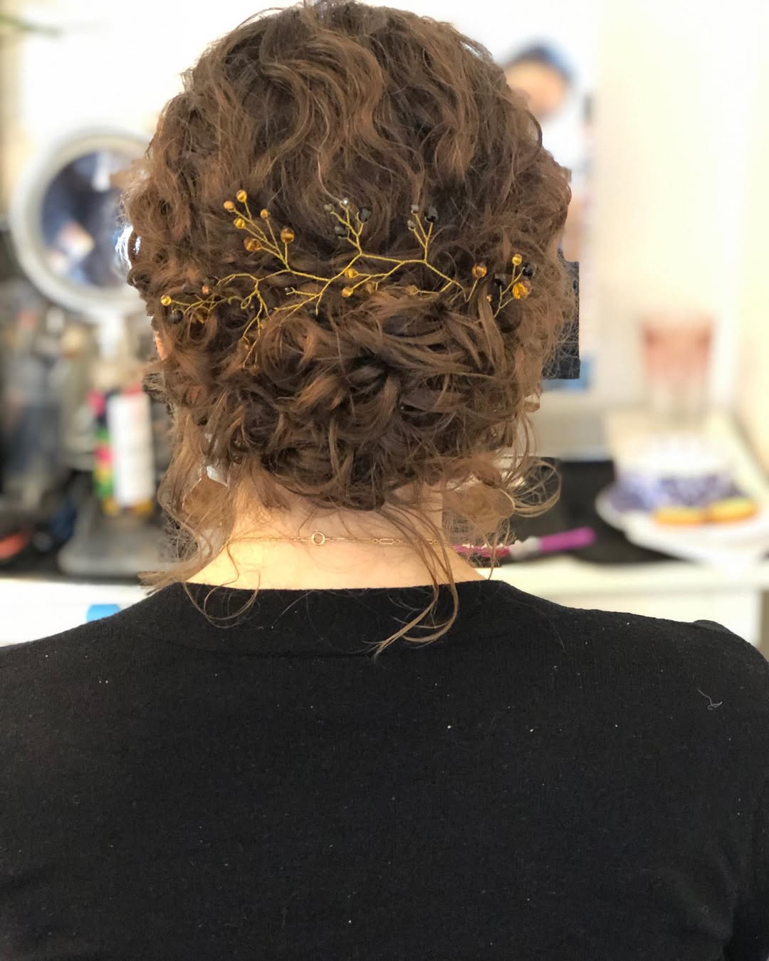 15 Curly Wedding Hairstyles That Will Make You Say “Wait… Why Didn’t I Do This Sooner?!” 4 Curly Low Bun with Tendrils