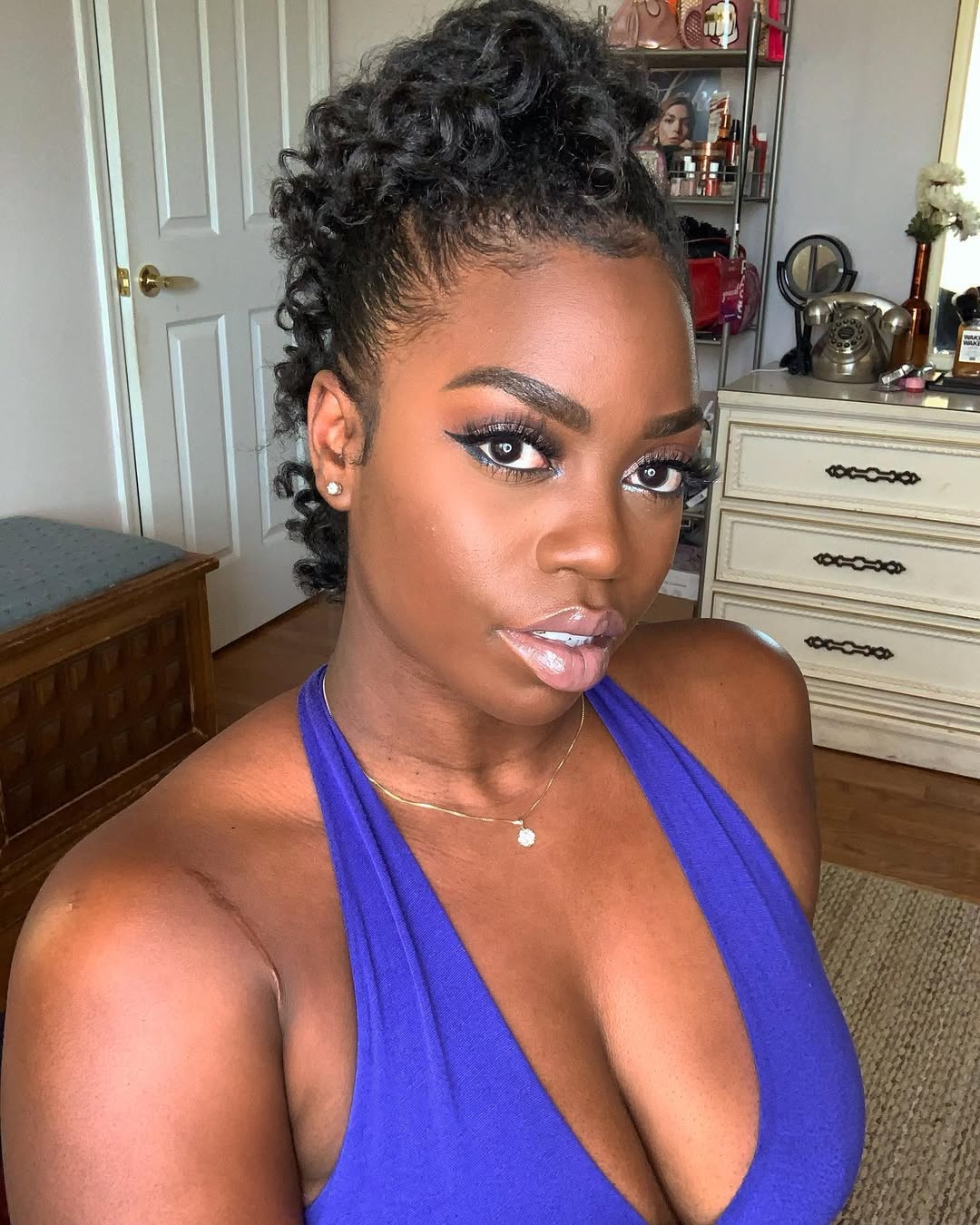 16 Short Curly Hairstyles for Women That Are Basically Effortless Chic 14 Curly Mohawk Style