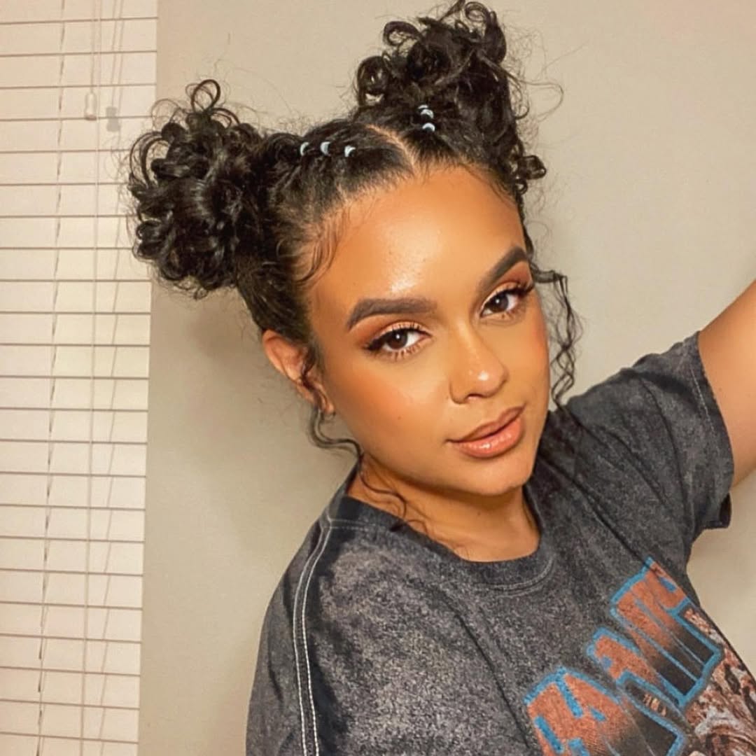 16 Curly Hairstyles for Work That Make You Look Effortlessly Put-Together (Even on Zero Coffee) 10 Curly Space Buns