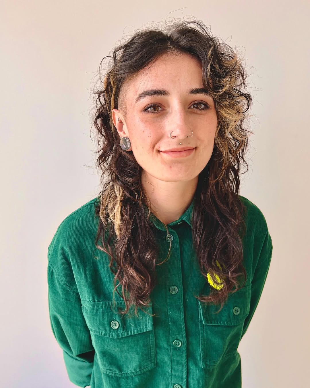 16 Short Curly Hairstyles for Women That Are Basically Effortless Chic 8 Curly Undercut