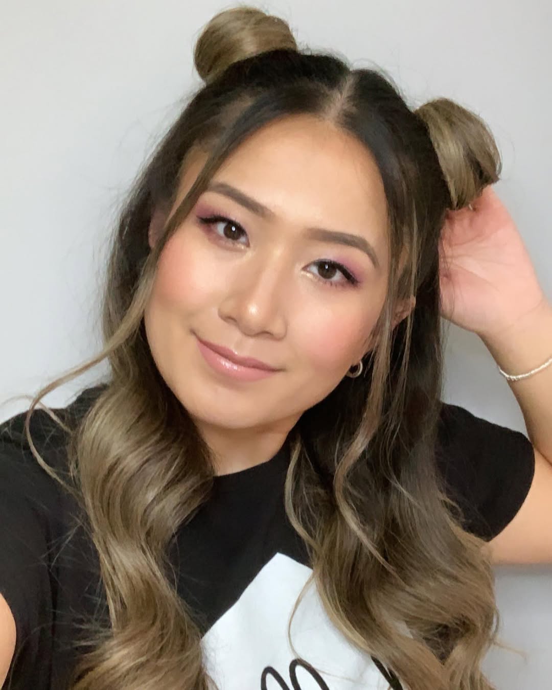 15 Curly Half-Up Half-Down Hairstyles That Are Too Cute Not to Try Right Now 4 Half-Up Space Buns