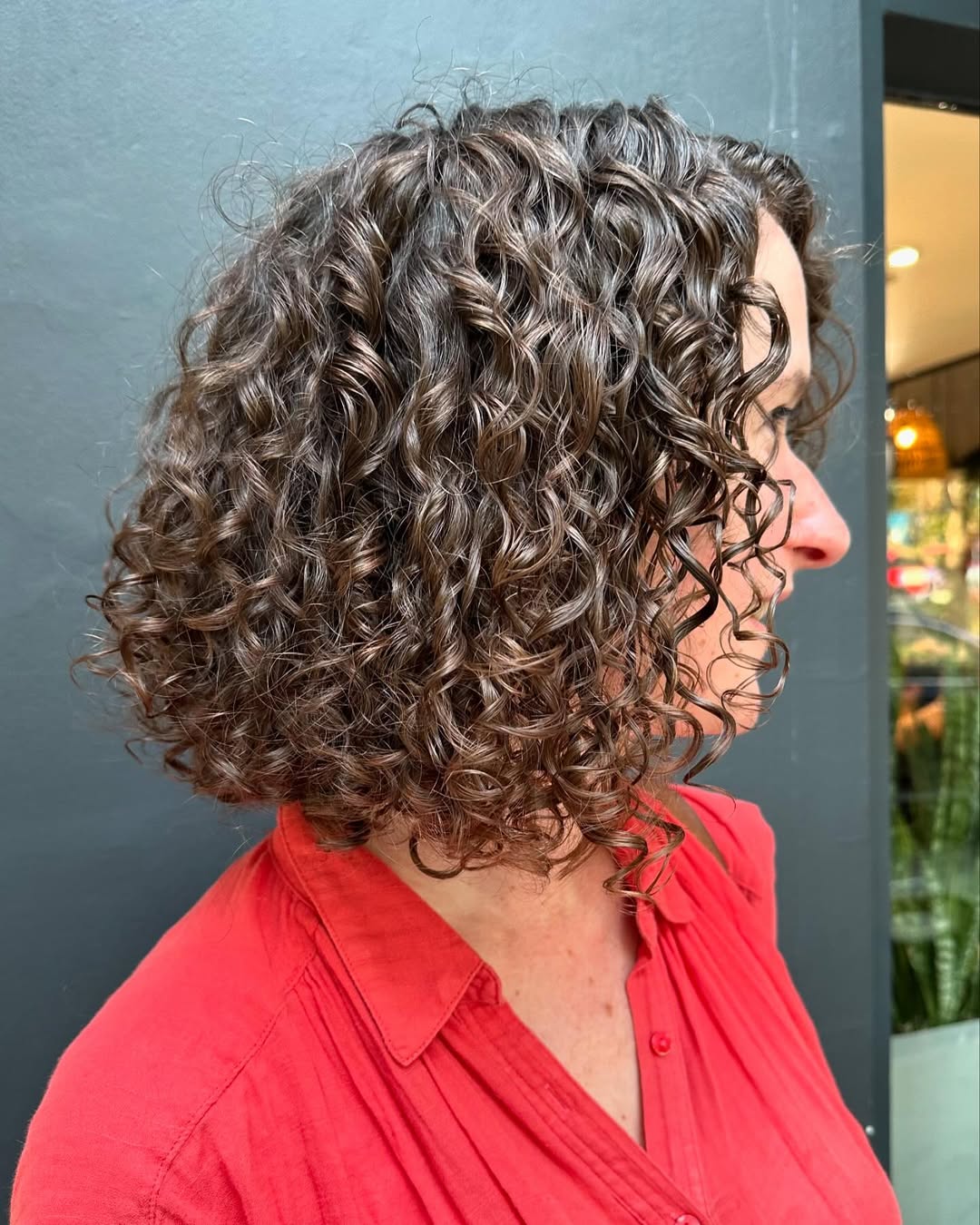 16 Short Curly Hairstyles for Women That Are Basically Effortless Chic 5 Layered Curly Bob
