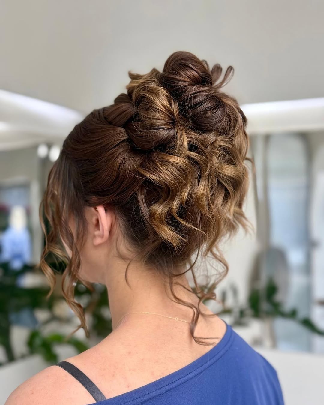 14 Work Hairstyle Ideas That Make You Look Effortlessly Put-Together (Even on 3 Hours of Sleep) 10 Messy Bun