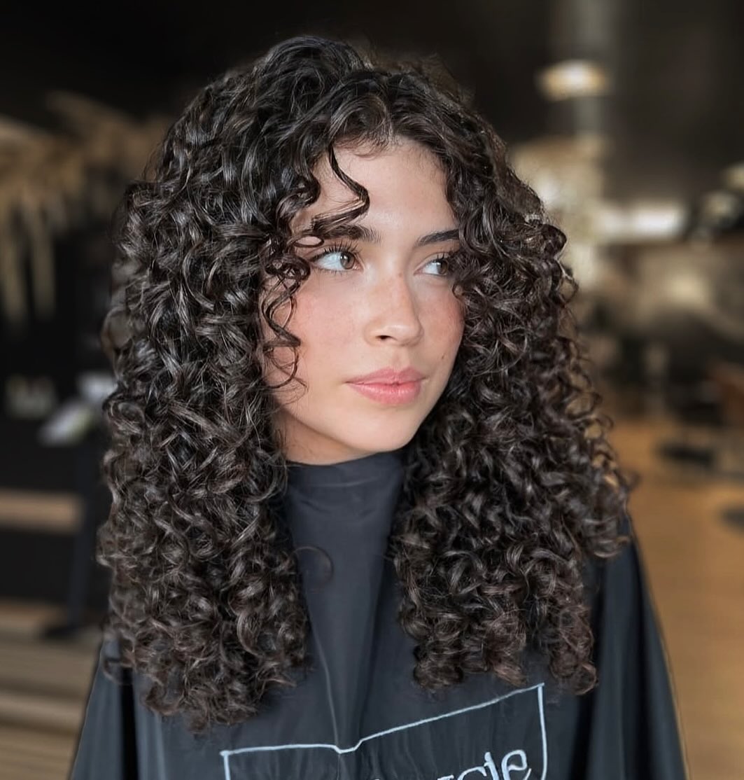 15 Short Curly Bob Hairstyles That’ll Instantly Make You Look Like That Girl 8 Messy Curly Bob