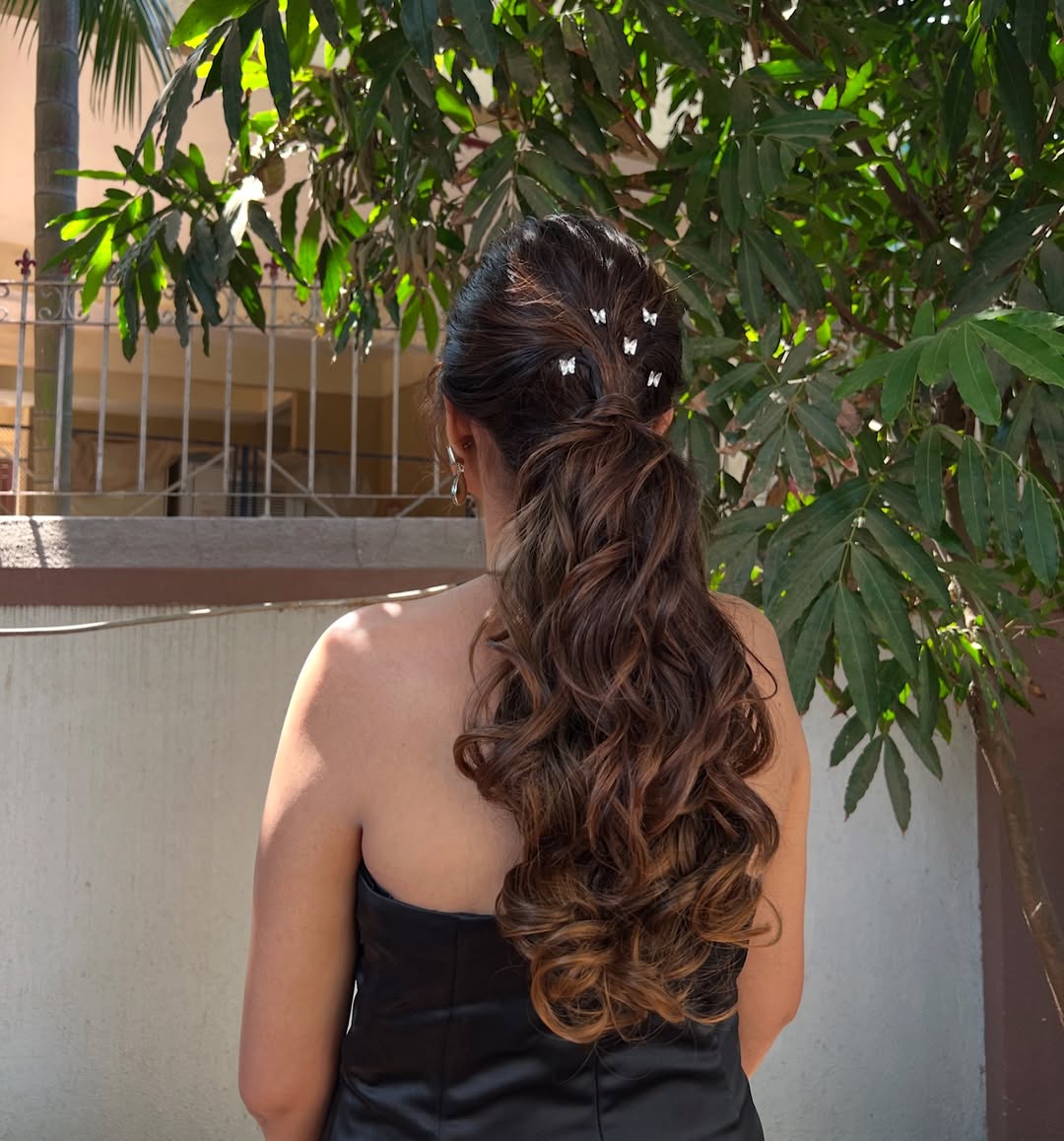 15 Curly Ponytail Hairstyles That Will Instantly Upgrade Your Entire Vibe 9 Messy Curly Ponytail