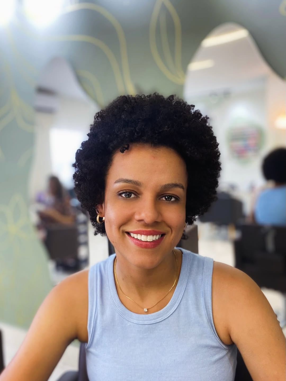 15 Curly Wedding Hairstyles That Will Make You Say “Wait… Why Didn’t I Do This Sooner?!” 16 Natural Afro with Floral Accents