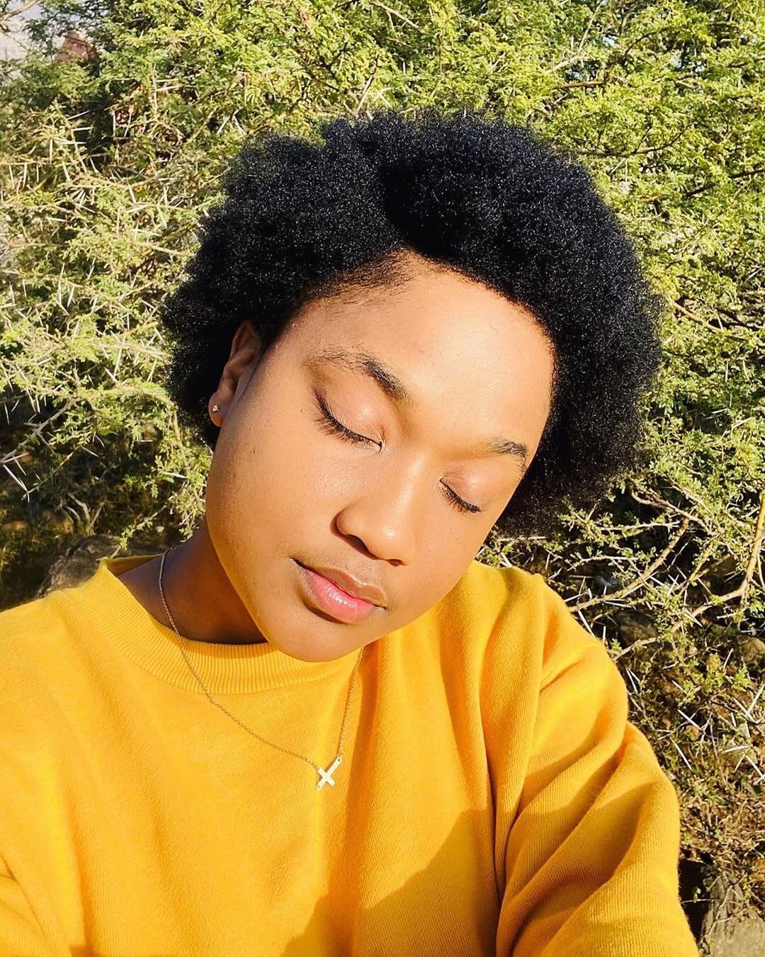 16 Short Curly Hairstyles for Women That Are Basically Effortless Chic 7 Short Afro